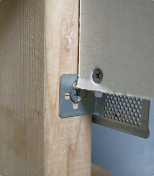 drywall backing clip secured to a stud and drywall